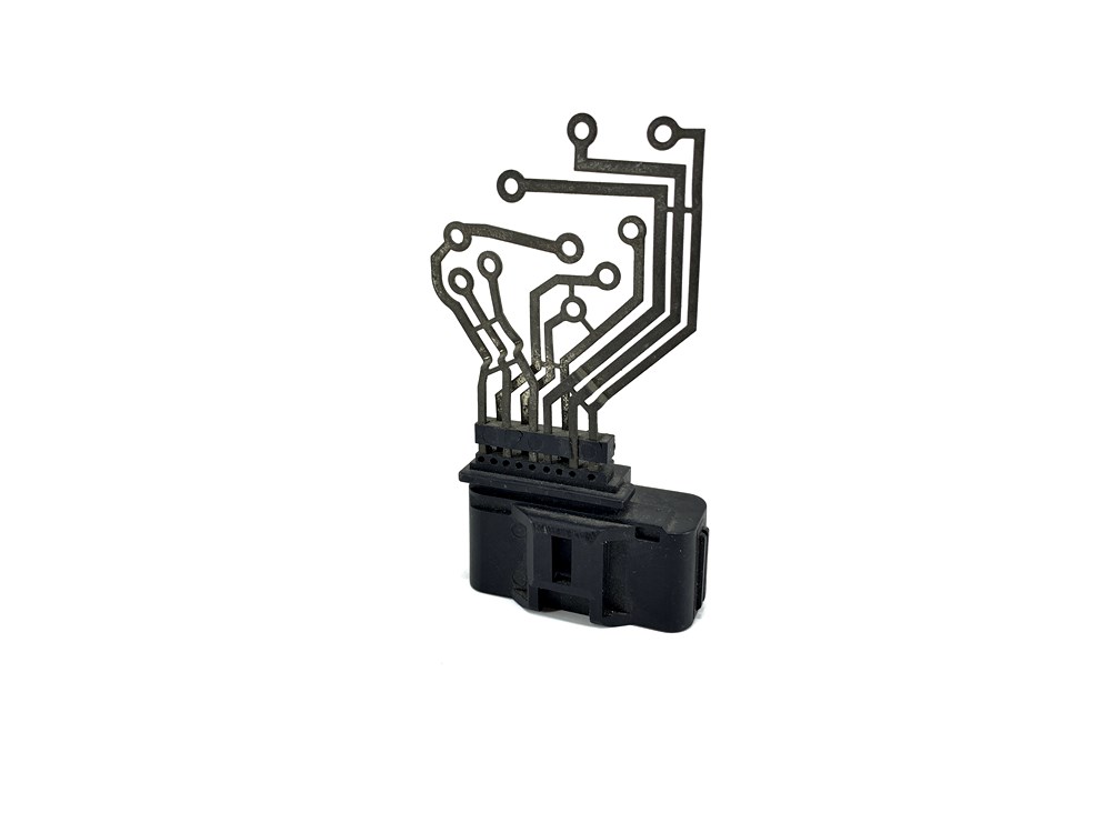 Metal embedded in plastic injection